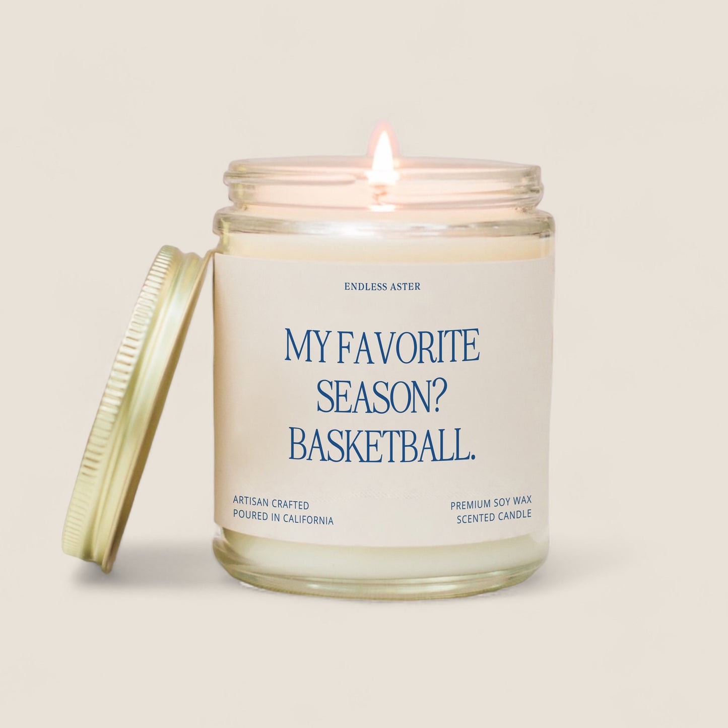 a candle with a label on it that says, my favorite season? basketball