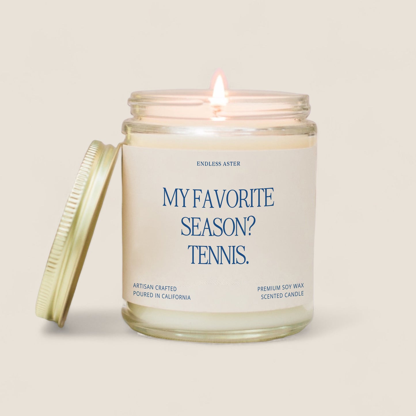 a candle with the words my favorite season? tennis on it