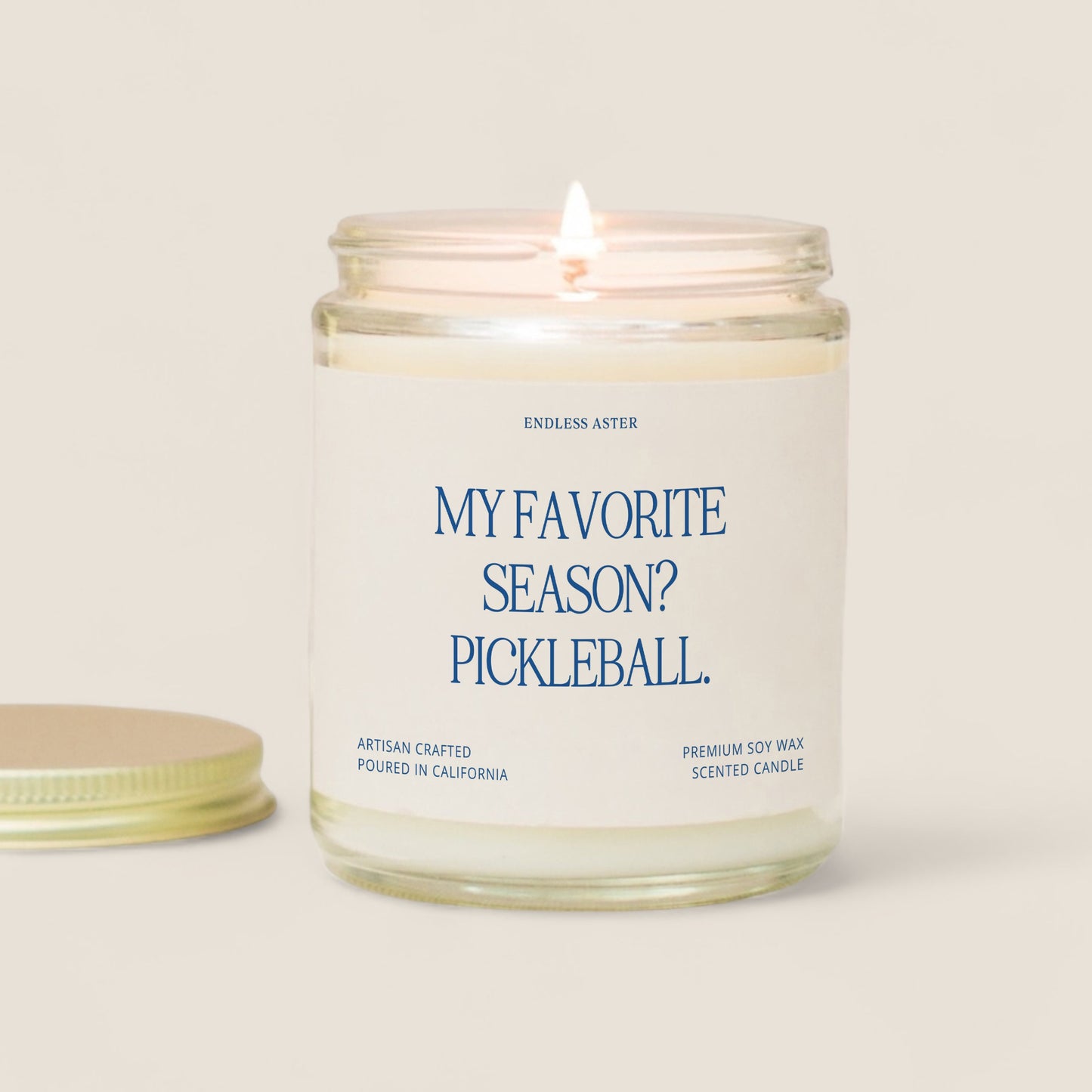 a candle that is next to a jar of pickleball