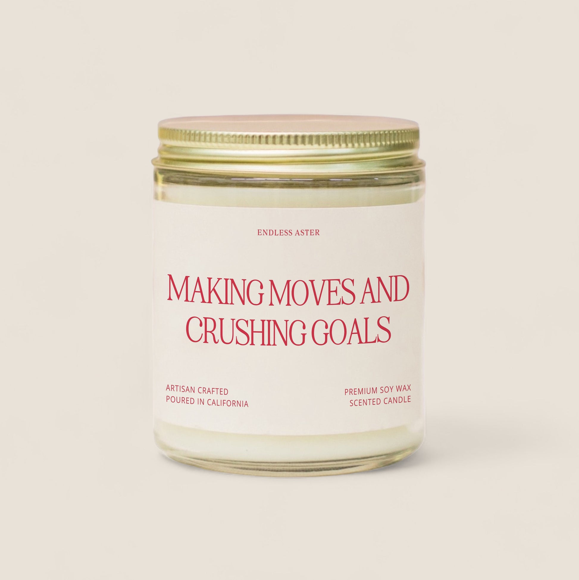 a candle with a label that says making moves and crushing goals